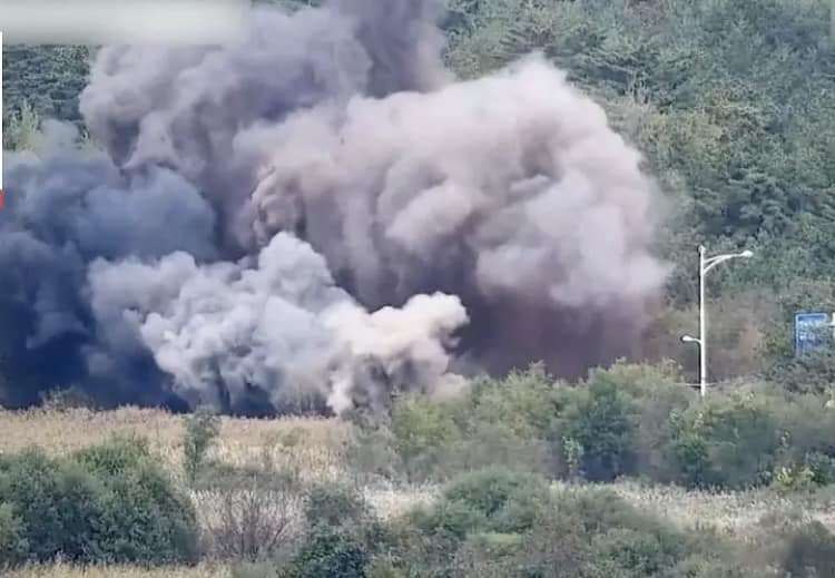North Korea blows up parts of inter-Korean roads in a symbolic display of anger